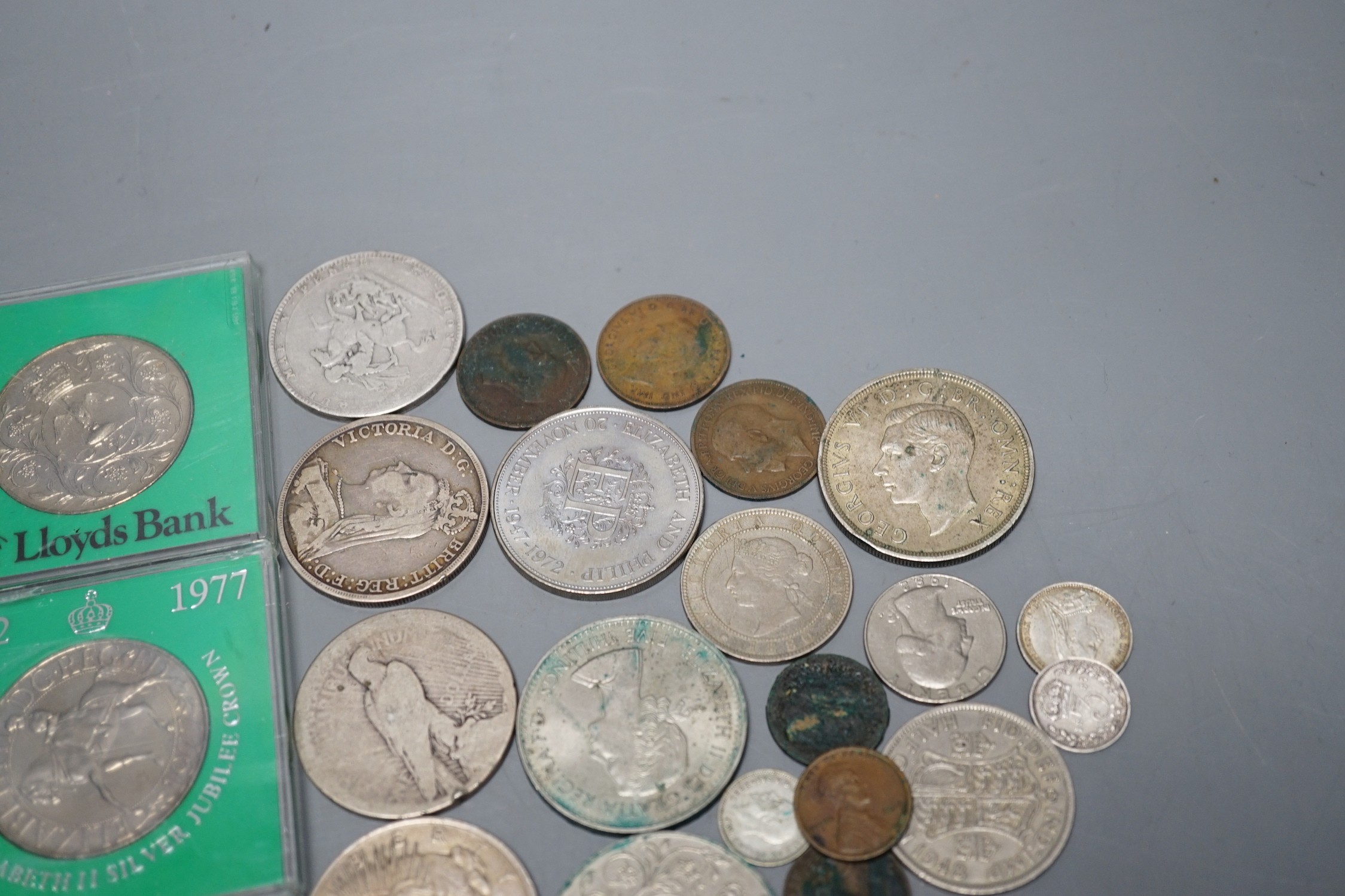 A group of mostly UK crowns and other coins, some pre-1920 silver coins and a 1976 Montréal Olympics commemorative silver coin